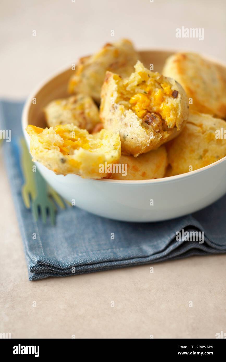 Mini spicy chicken and mimolette cheese cakes Stock Photo