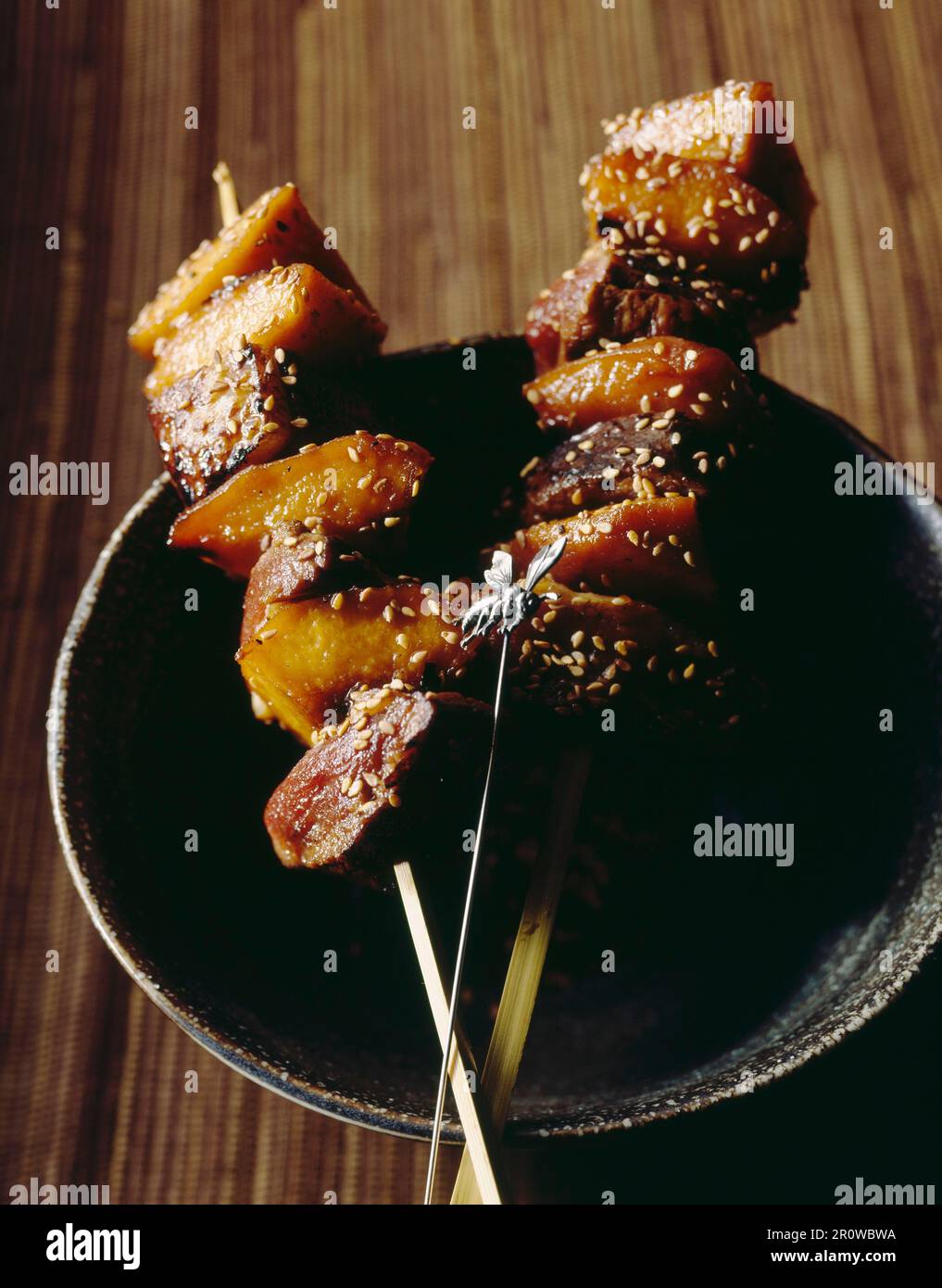 Duck skewers with quince Stock Photo