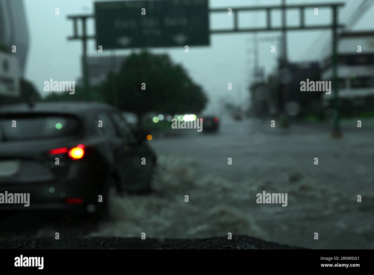 Road on rainy day, view through car window with water drops Stock Photo ...