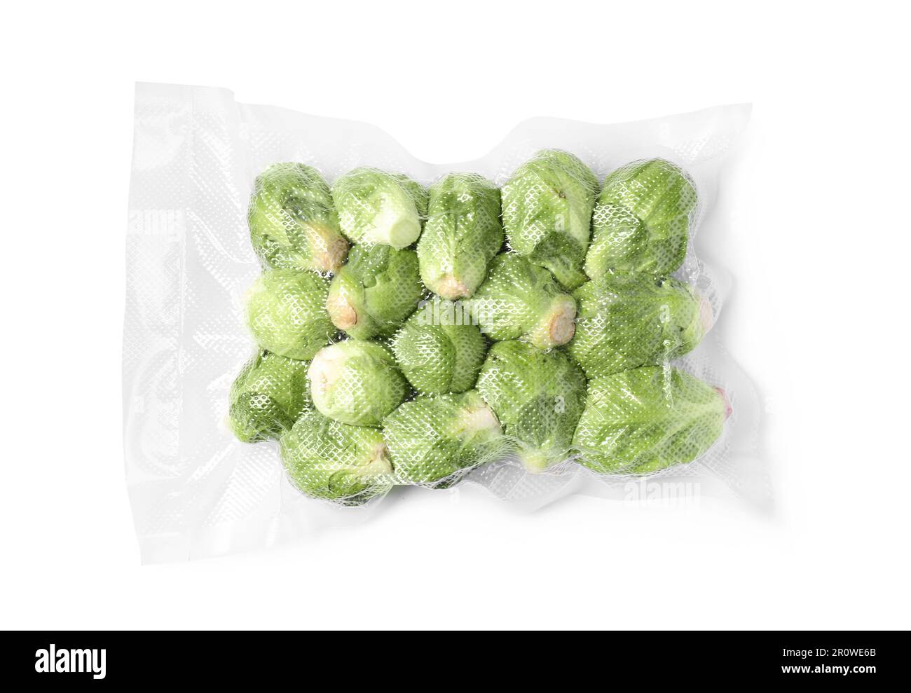 Vacuum pack of Brussels sprouts isolated on white, top view Stock Photo