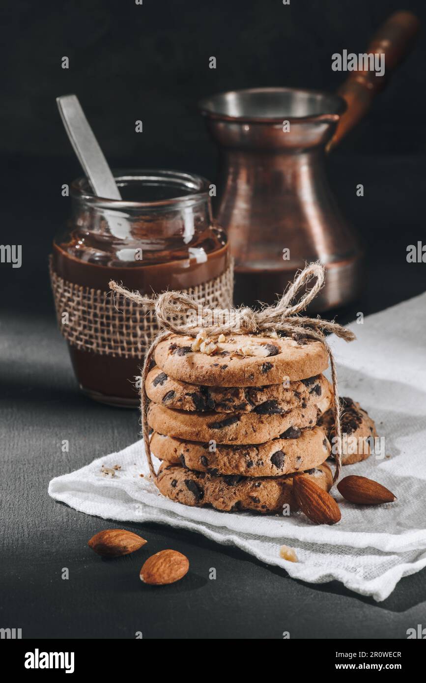 Chocolate-chip cookies tied with thread Stock Photo - Alamy