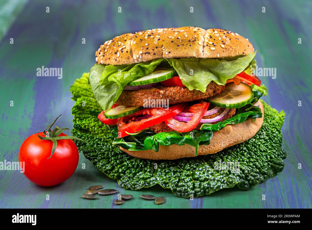 Vegan burger on cabbage leaf Stock Photo Alamy