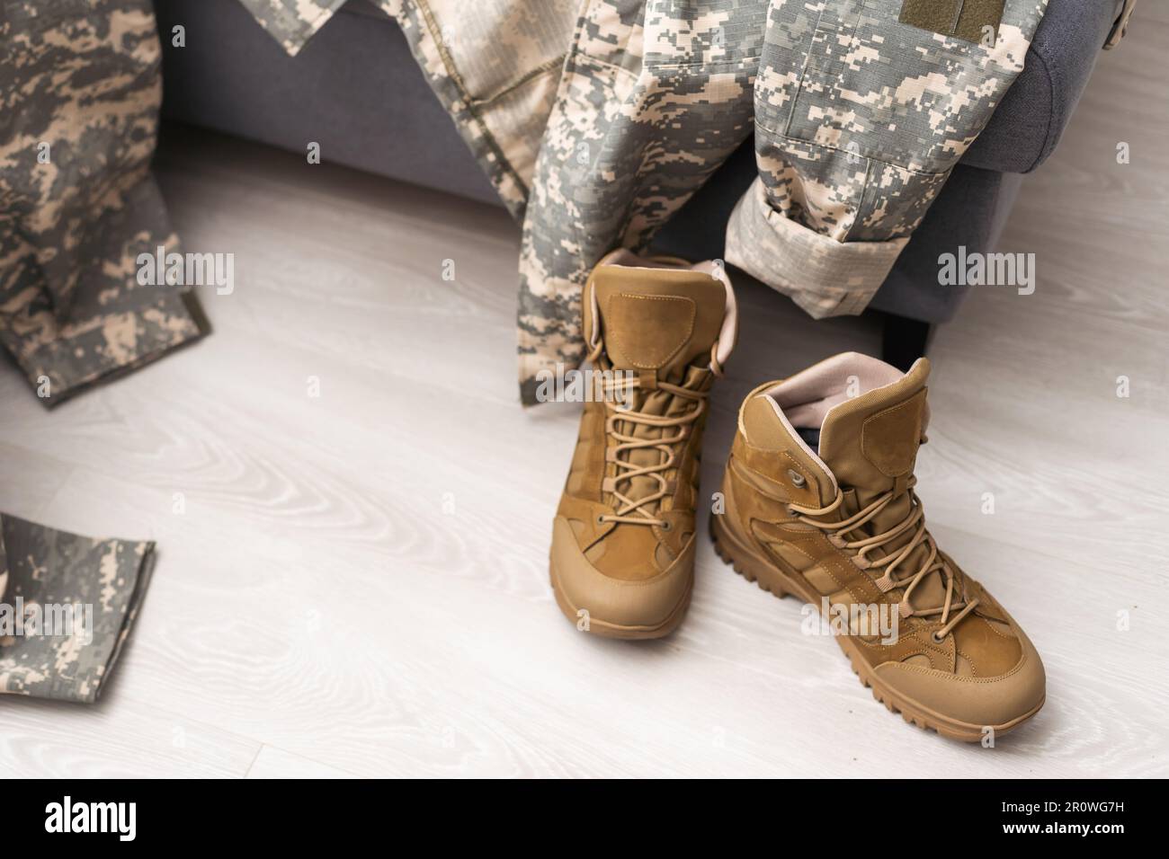 military camouflage uniforms and boots Stock Photo Alamy