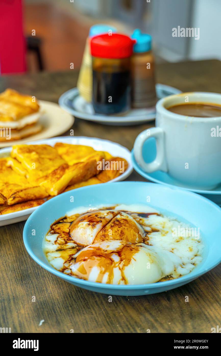 Traditional breakfast set and coffee, boiled eggs and toast, popular in