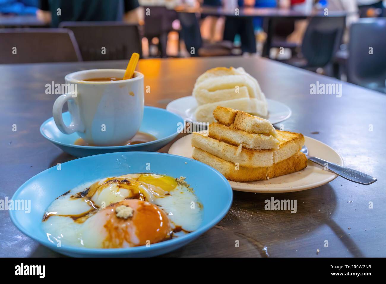 Traditional breakfast set and coffee, boiled eggs and toast, popular in