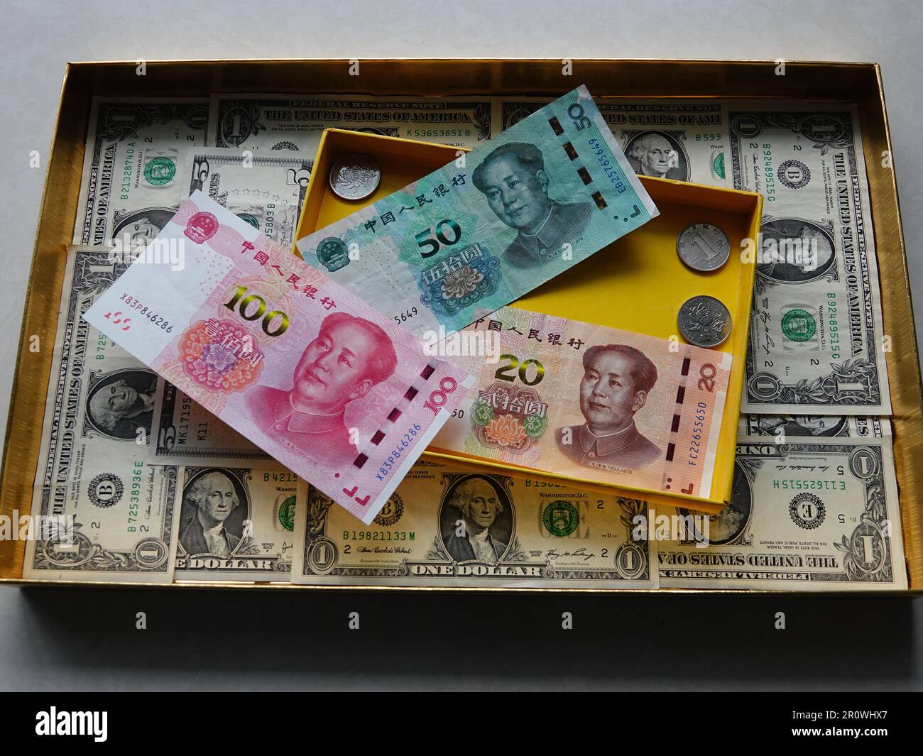 YICHANG, CHINA - MAY 10, 2023 - Chinese yuan and U.S. dollar in Yichang,  Hubei Province, China, May 10, 2023. The Central bank authorized the China  Fo Stock Photo - Alamy