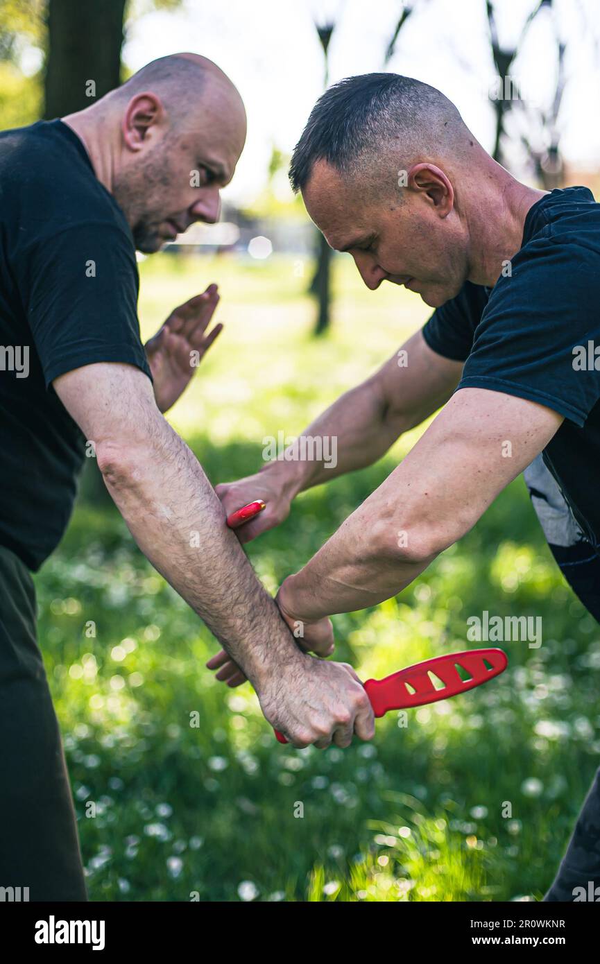 Knife vs knife fight combat training. Sumbrada training method. Plastic
