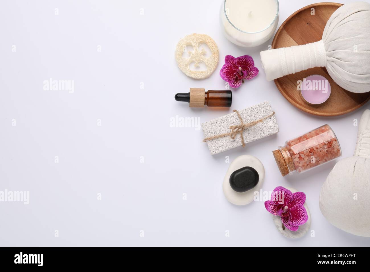 Flat lay composition with different spa products on white background ...