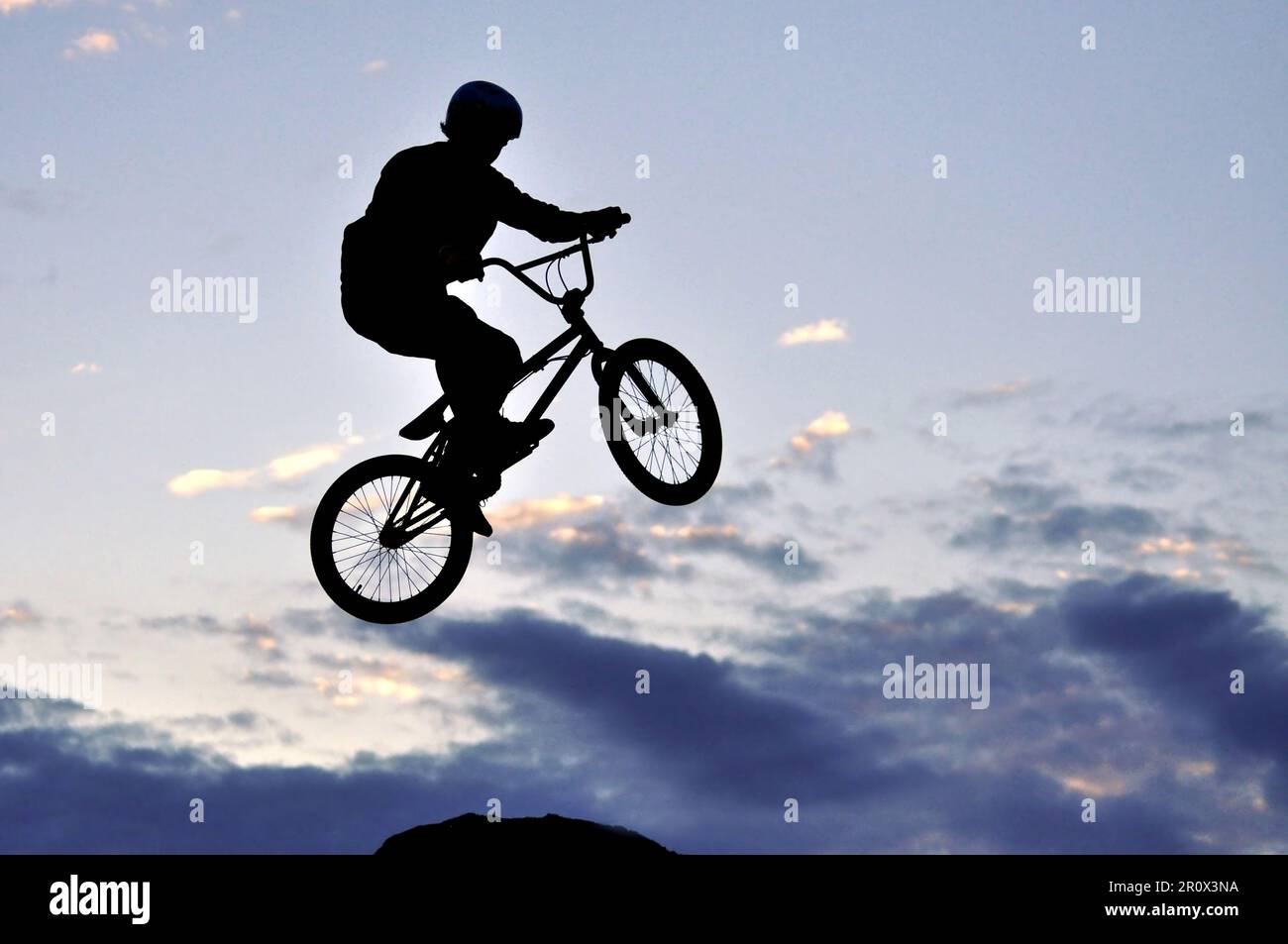 Silhouette of a jumping BMX rider Stock Photo Alamy