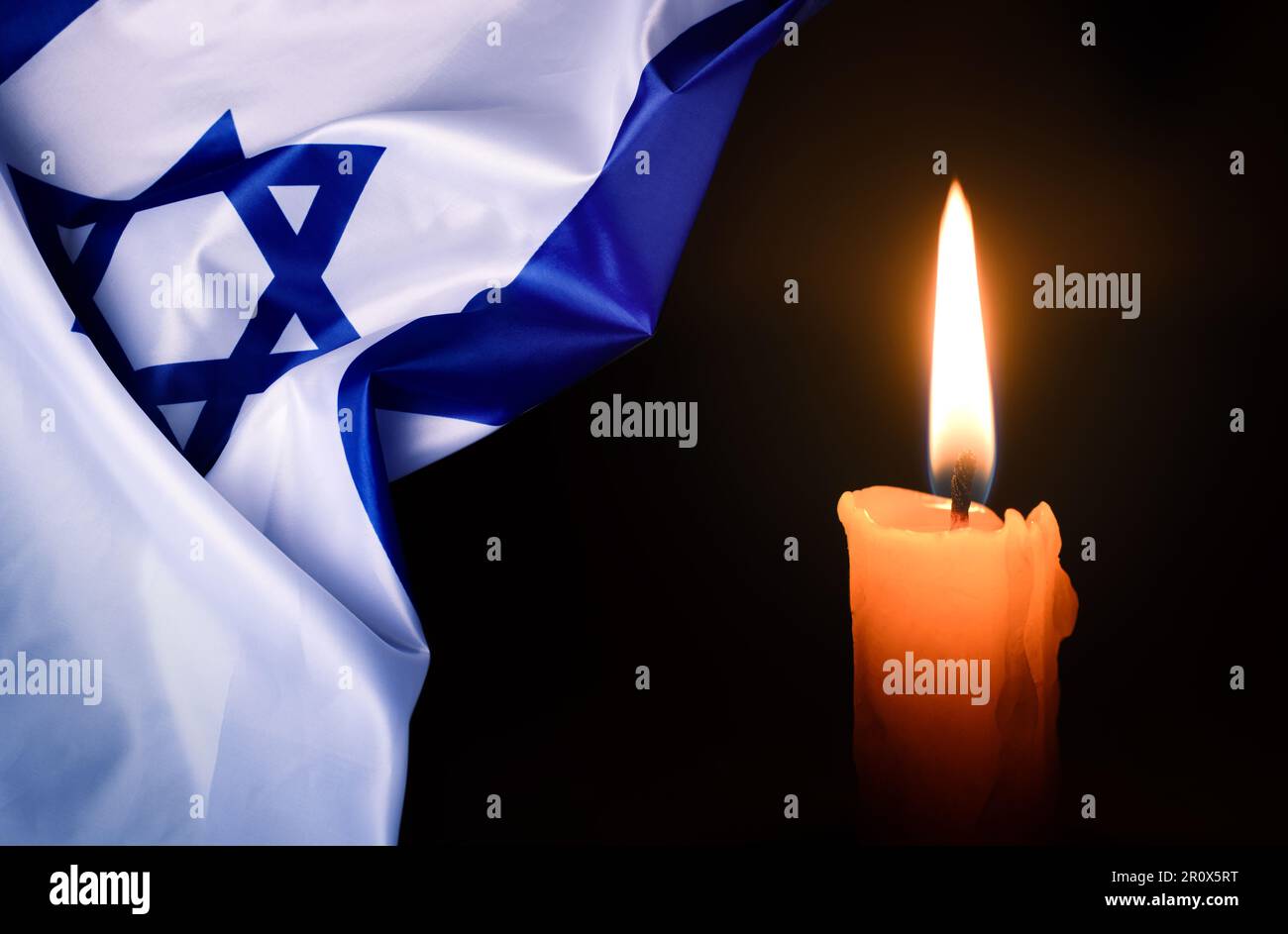 Holocaust Remembrance Day. Yom HaShoah. Bright Burning Candle and the