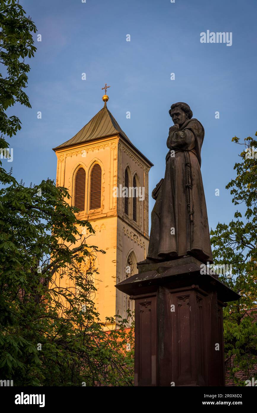 Church Tower of the Martinskirche - St. Martin’s church and Berthold Schwarz Fountain, Old Town, Freiburg im Breisgau, Baden-Württemberg, Germany Stock Photo