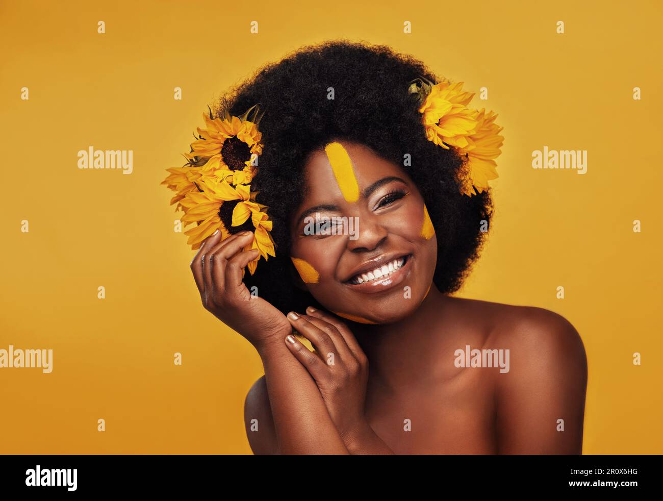 Makeup, sunflower and portrait of black woman in studio for beauty ...