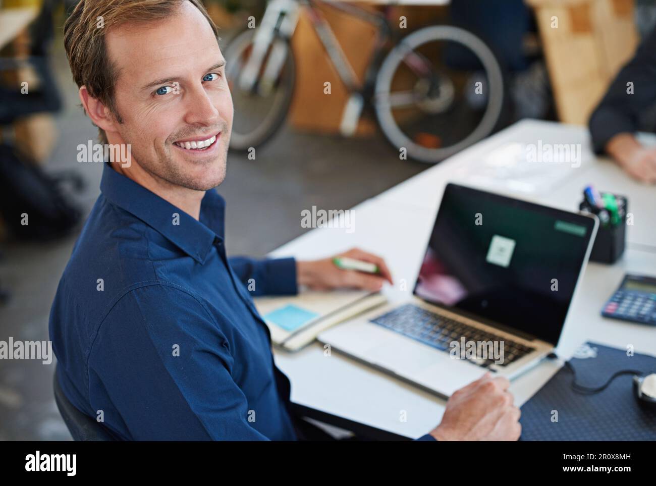 Developing tomorrows tech today. a designer at their workstation in an office. Stock Photo