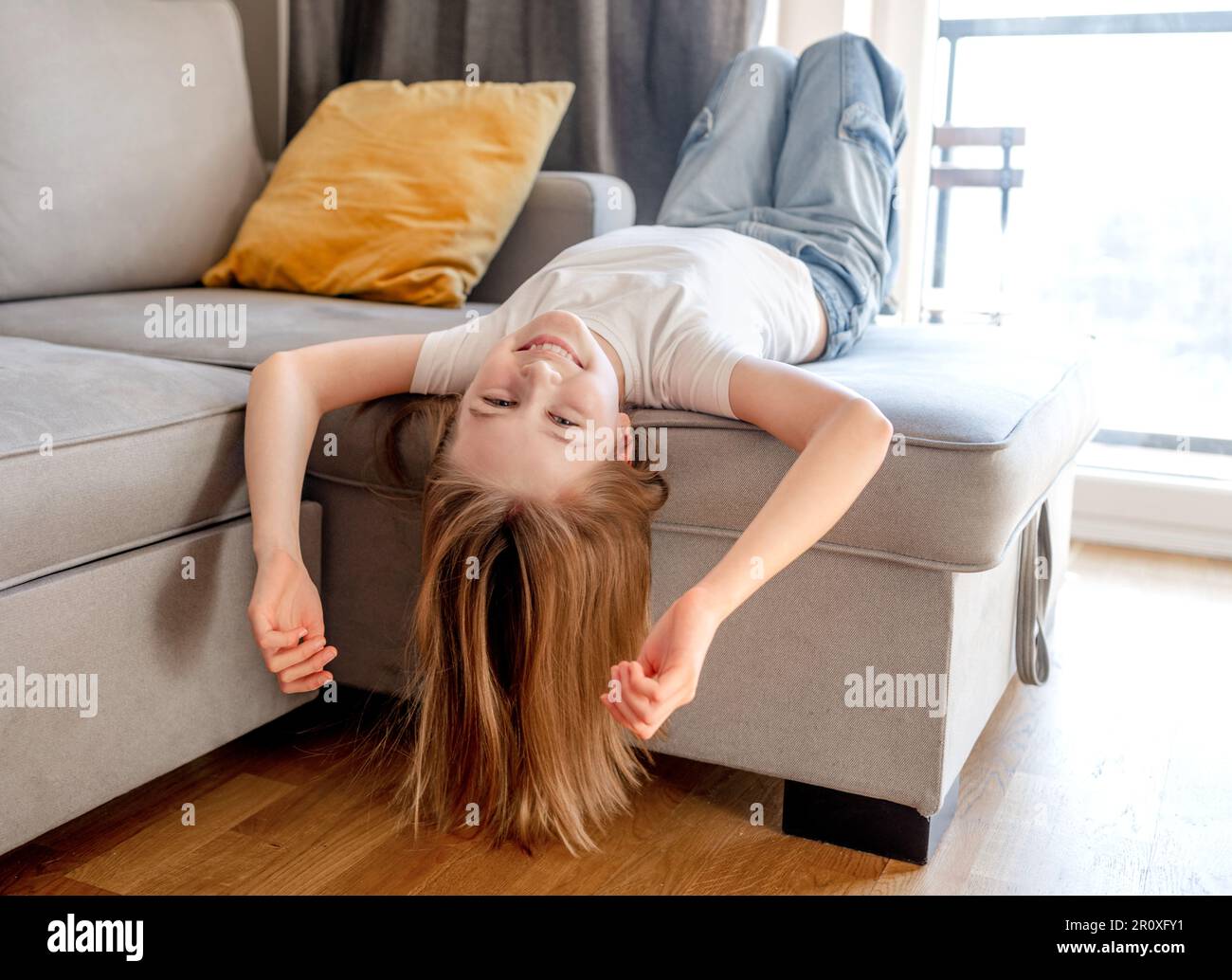 Preteen girl posing into room hi-res stock photography and images - Alamy
