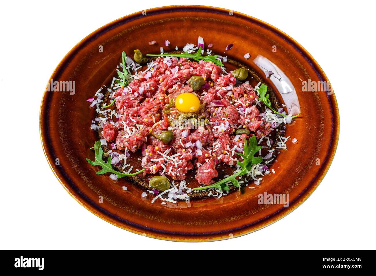 Beef steak tartare with raw egg yolk, pickled capers and Parmesan