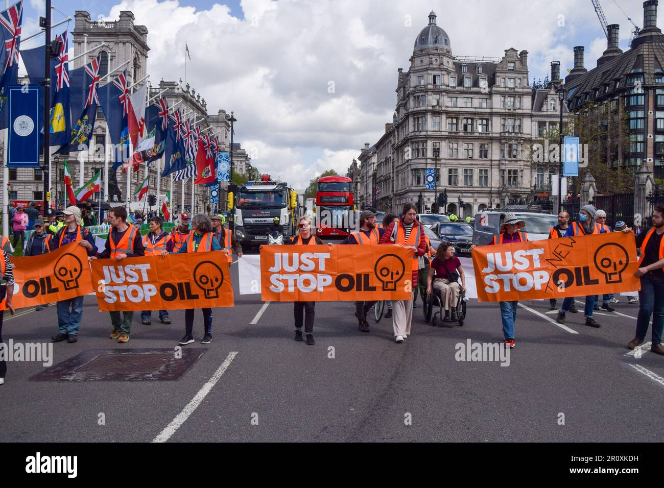 London, UK. 10th May 2023. Just Stop Oil activists block the traffic in