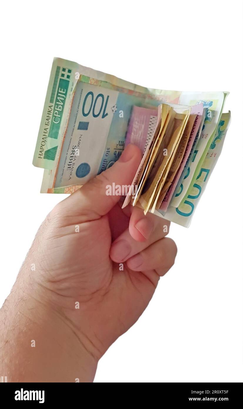 Hand holding cash money isolated on white Stock Photo - Alamy