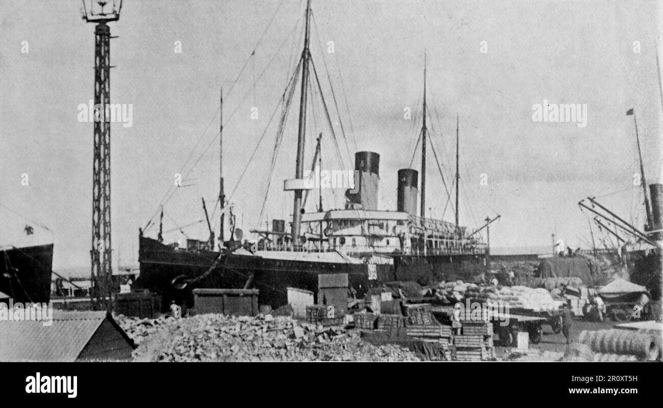 The Boer War, also known as the Second Boer War, The South African War and The Anglo-Boer War. This image shows: Crowded Docks at Cape Town: The R.M.S. Majestic takes up a good deal of room. Original photo by “Navy and Army”, c1899. Stock Photo