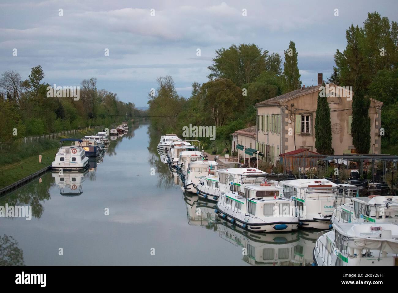Rent boats in the harbor of Bram, Canal du Midi, France Stock Photo