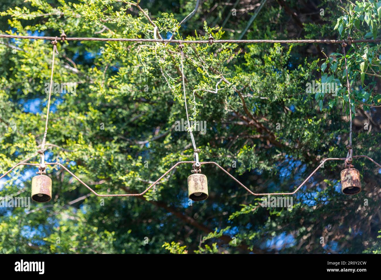 Old disused warning bells over the Church Lane Crossing on the Greater
