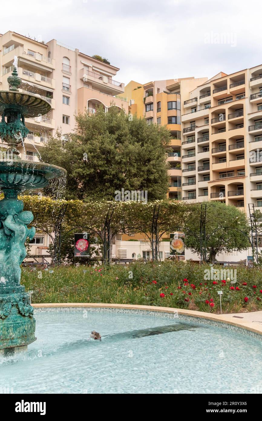Fontvieille, Monaco, April 21st 2023 A fountain with apartments