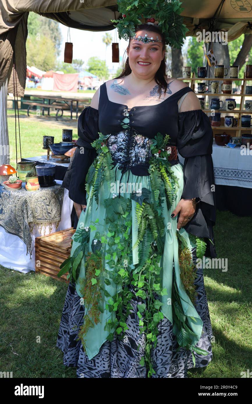 4152023 Visalia, California Vendors and art in period costumes at a