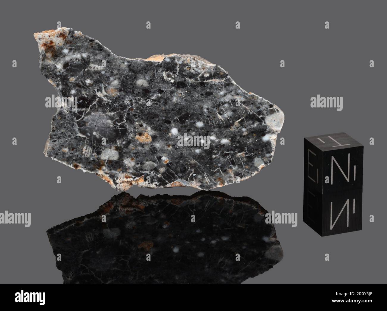 Bechar 003 - Found 2022, Bechar, Algeria, Africa. Lunar feldspathic breccia. Total mass 1522 grams. Slice of lunar meteorite Bechar 003 Stock Photo