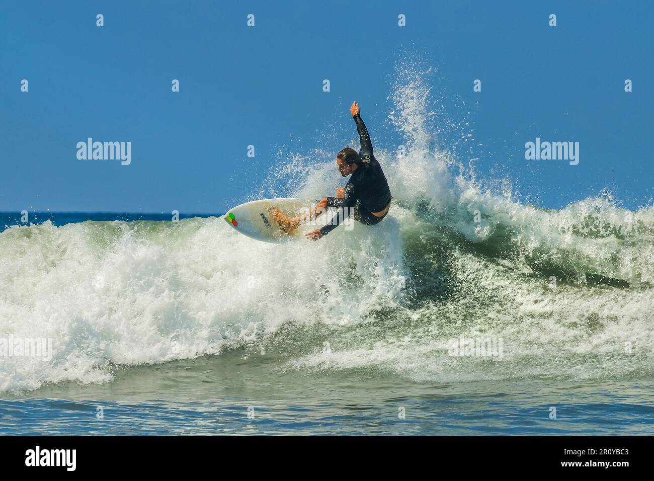 Shortboard surfer does a cutback turn on a wave at this fastgrowing