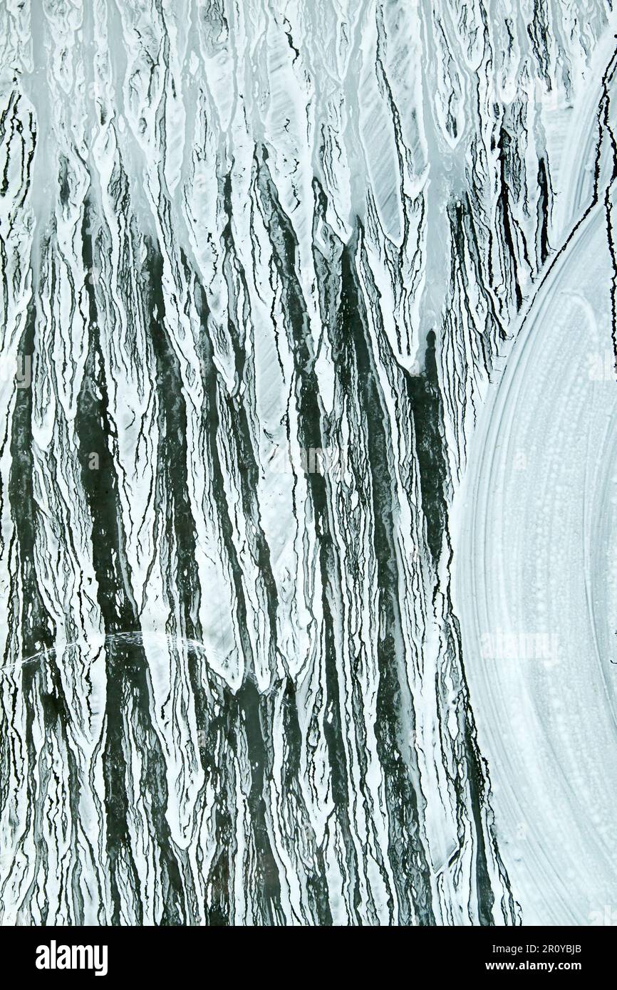 Dry dripping white paint on a glass surfacedripping Stock Photo Alamy