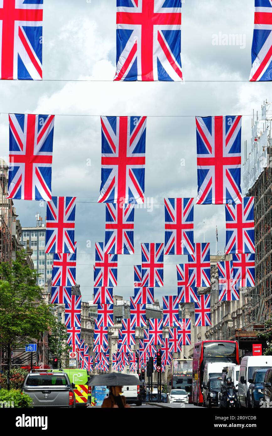 A spectacular display of Union Jack flags in Regent Street to celebrate the coronation of King Charles Third Central London England UK Stock Photo