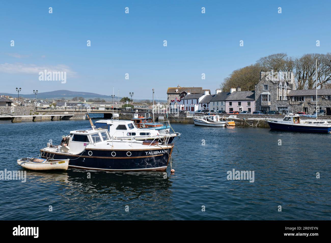 The pretty harbor in Castletown at the South end of the Isle of Man is a lovely place to wander and relax Stock Photo