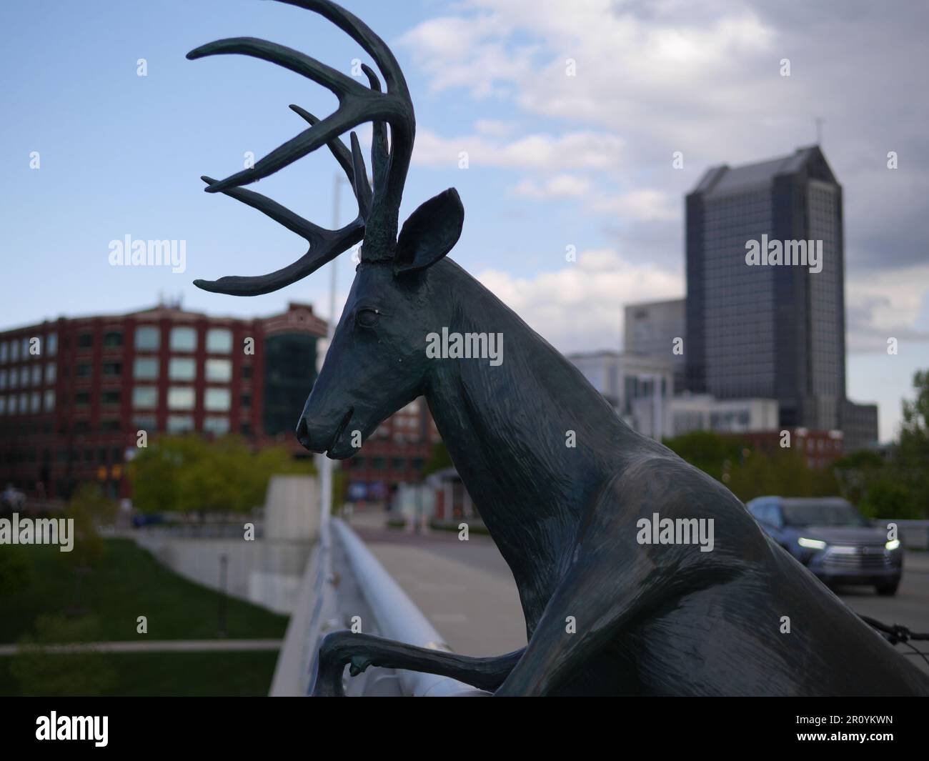 A bronze statue of a deer figure standing in a public area of downtown Columbus, Ohio Stock Photo