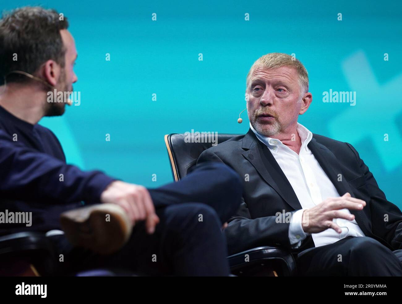 Hamburg, Germany. 10th May, 2023. Boris Becker (r), former tennis player, sits next to Philipp Westermeyer, OMR Managing Director, on stage at the OMR digital trade show in the exhibition halls. Around 70,000 visitors are expected to attend this year's OMR Festival in Hamburg. It is one of the largest marketing and digital conferences in Europe. Credit: Marcus Brandt/dpa/Alamy Live News Stock Photo