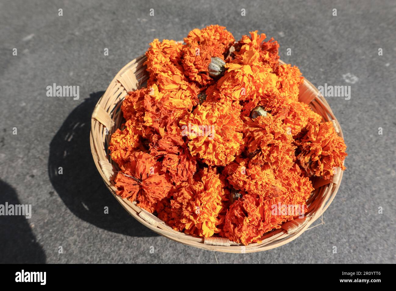 orange Marigold flowers in basket Stock Photo
