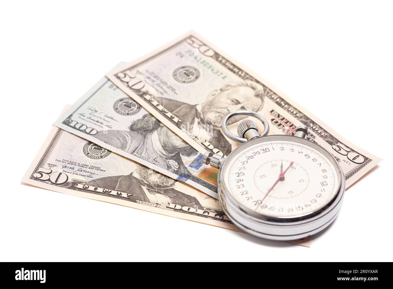 Stopwatch with dollar banknotes. Time is money concept Stock Photo Alamy