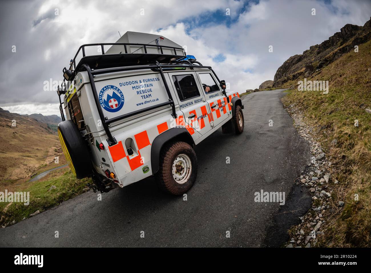 Duddon & Furness Mountain Rescue Team driving up Hardknott Pass, the steepest road in England, Eskdale, Lake District, UK. Stock Photo