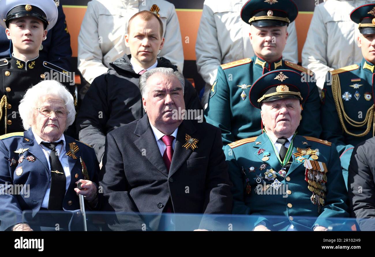 Moscow, Russia. 09th May, 2023. Tajik President Emomali Rahmon, center, alongside veterans watches the annual Victory Day military parade through Red Square, marking the 78th anniversary of the victory over Nazi Germany in World War Two, May 9, 2023 in Moscow, Russia. Credit: Gavriil Grigorov/Kremlin Pool/Alamy Live News Stock Photo