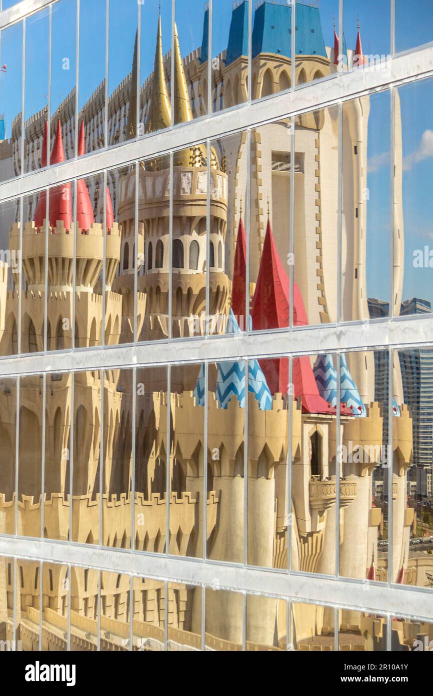 The Excalibur hotel, resort, and casino in Las Vegas, Nevada. Mirror effect in windows of Luxor hotel. Stock Photo