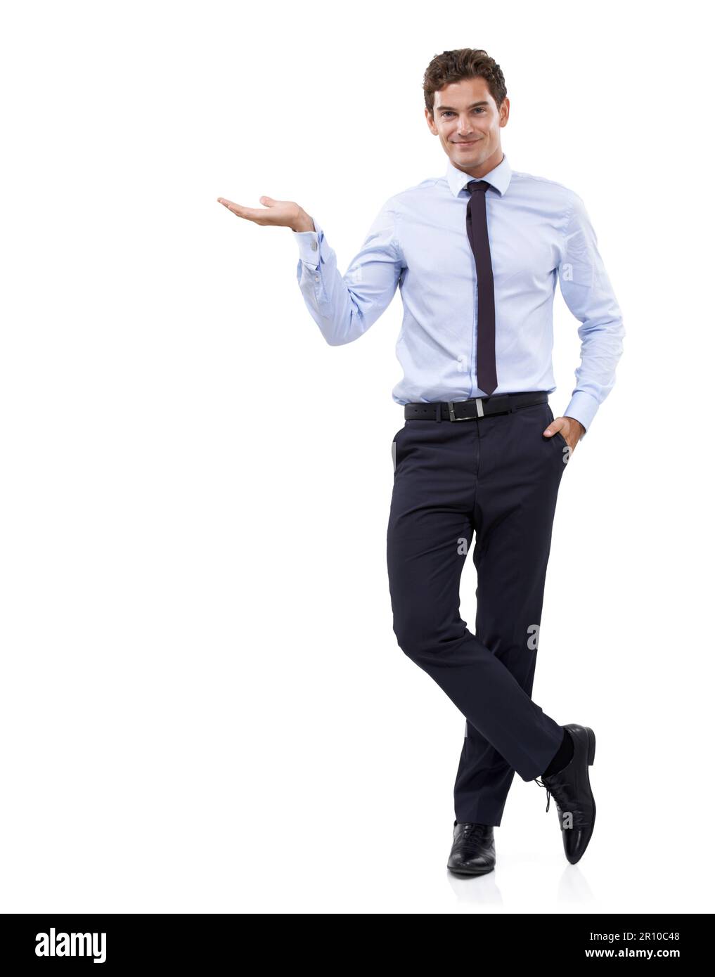 Your product is in good hands. A young businessman displaying copyspace. Stock Photo