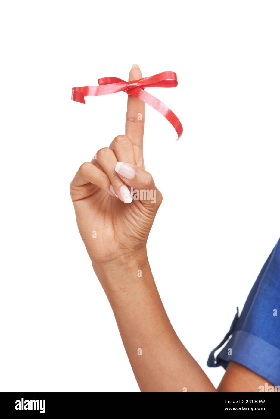 Some constructive criticism. Cropped image of a woman with a ribbon wrapped around her finger. Stock Photo