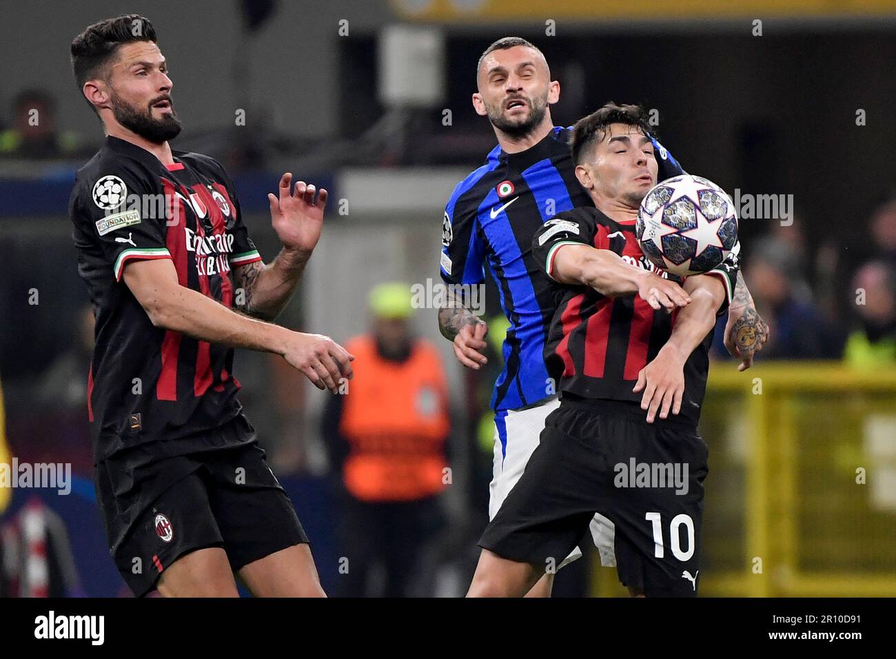 Milan, Italy. 10th May, 2023. Olivier Giroud of AC Milan, Marcelo Brozovic of Fc Internazionale and Brahim Diaz of AC Milan compete for the ball during the Uefa Champions League football match between AC Milan and FC Internazionale at San Siro stadium in Milan (Italy), May 10th 2023. Credit: Insidefoto di andrea staccioli/Alamy Live News Stock Photo