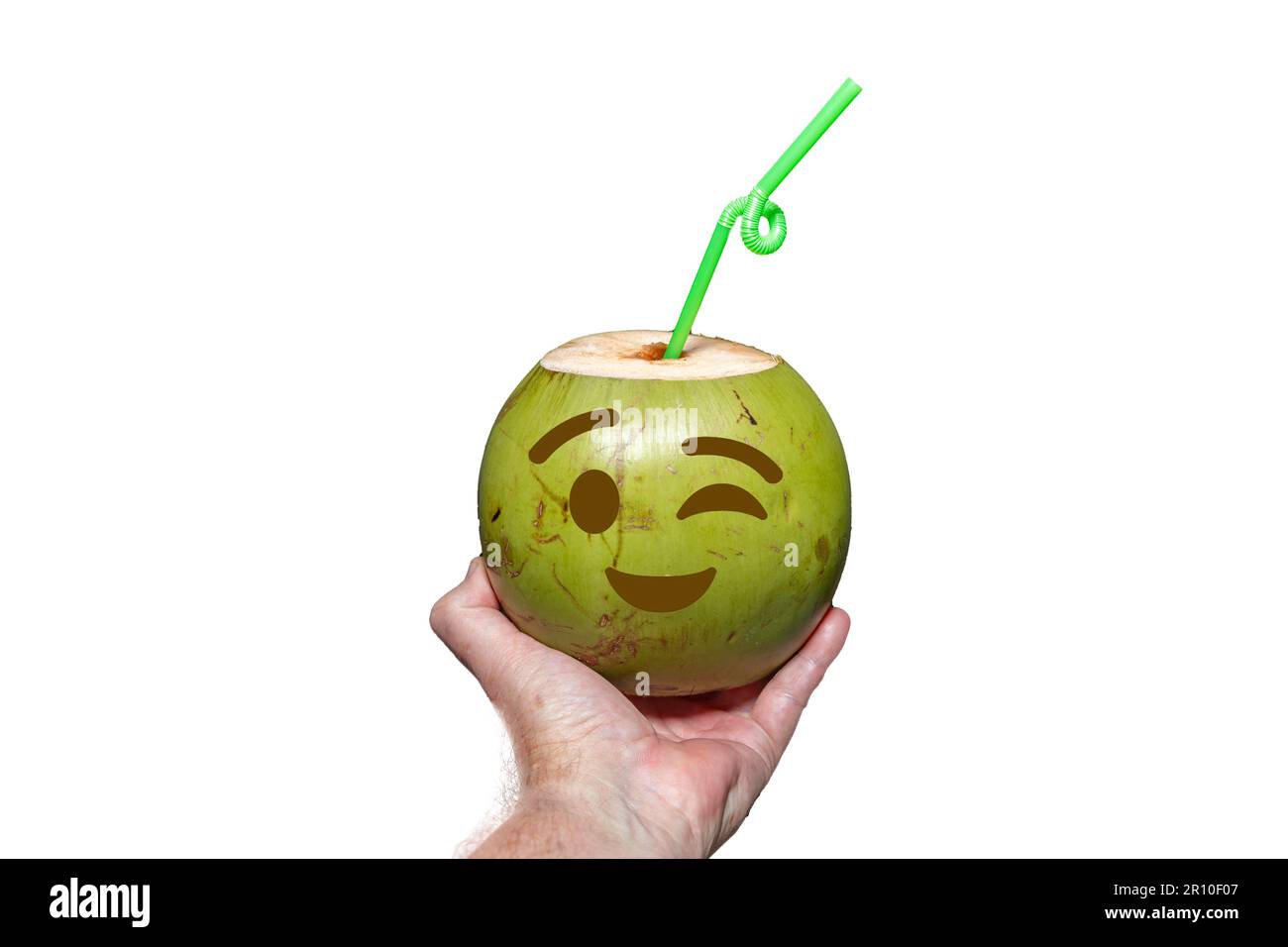 Green coconut with drawn emoji. tropical coconut water in selective