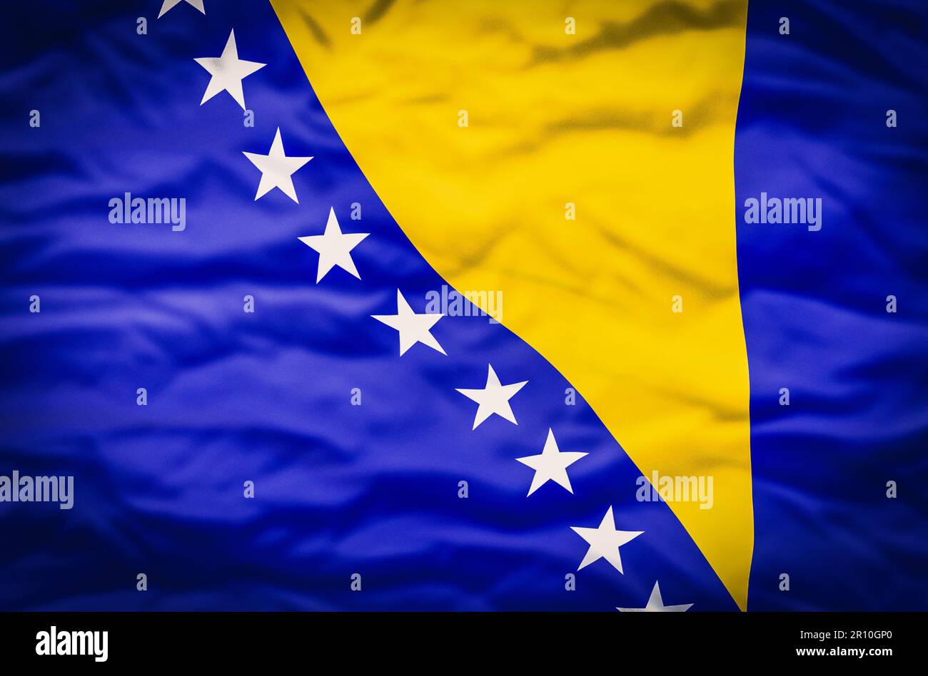 Bosnia and Herzegovina flag on fabric wavy background. Wavy flag of ...