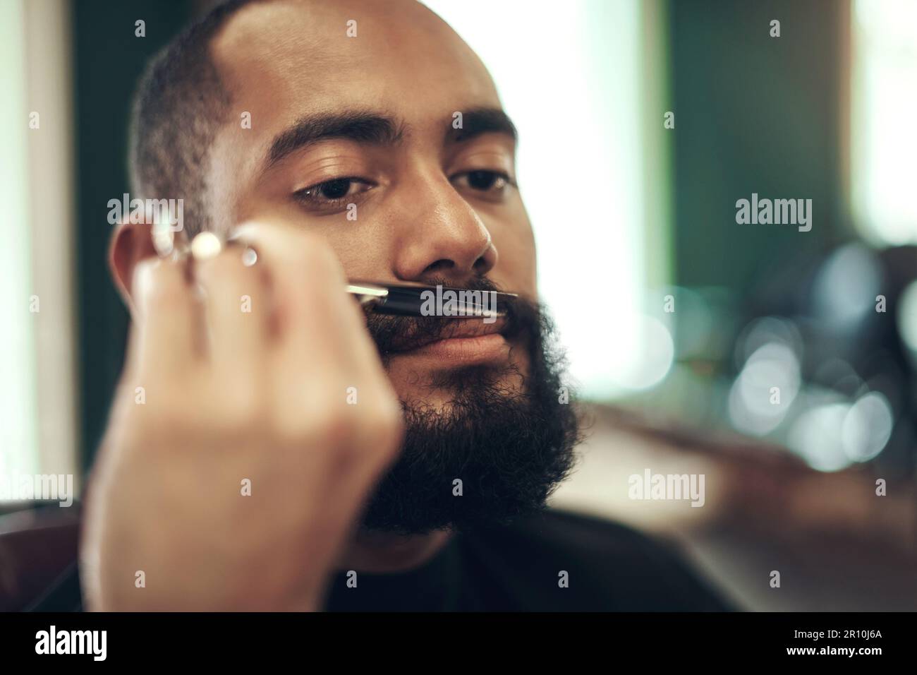 We cant have this moustache covering your upper lip. a handsome young