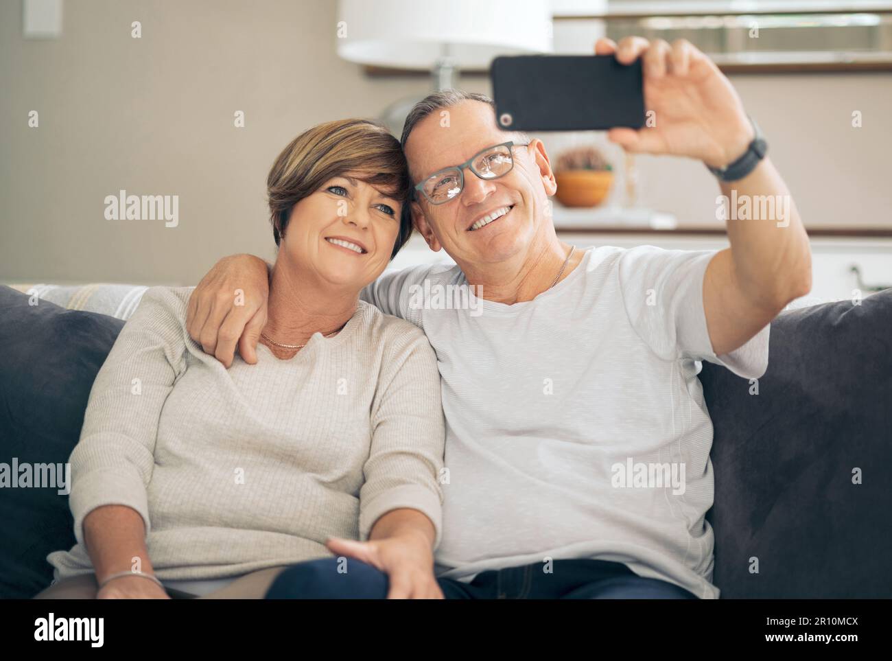 I always want to remember us this way. a mature couple taking selfies. Stock Photo