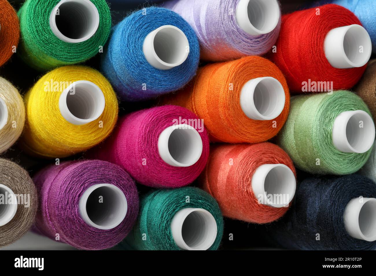Top view of colorful sewing threads as background, closeup Stock Photo ...