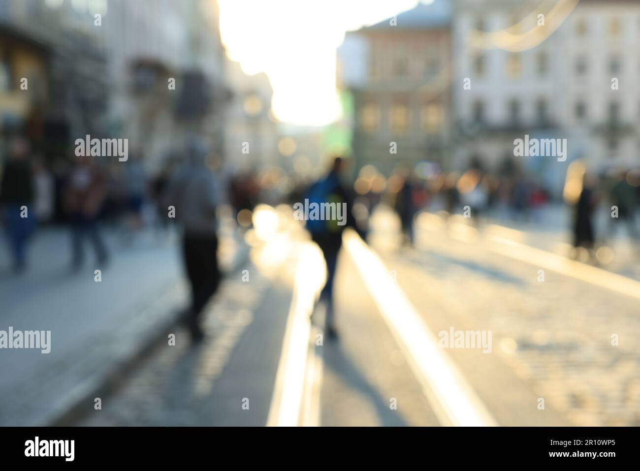 Blurred view of people walking on city street Stock Photo - Alamy