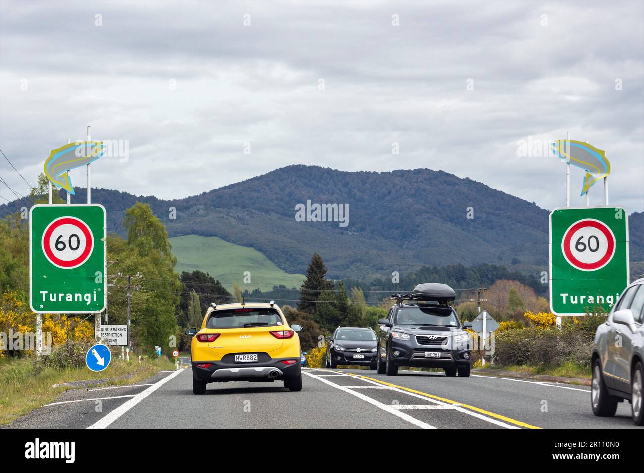 October 25, 2022: Cars traveling on State Highway 1 through Turangi, New Zealand in spring. Stock Photo