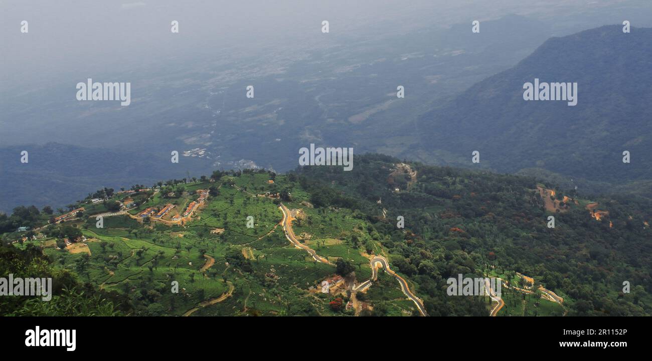 birds eye view of lush green valley of nilgiri mountains at coonoor hill station near ooty in tamilnadu, south india Stock Photo