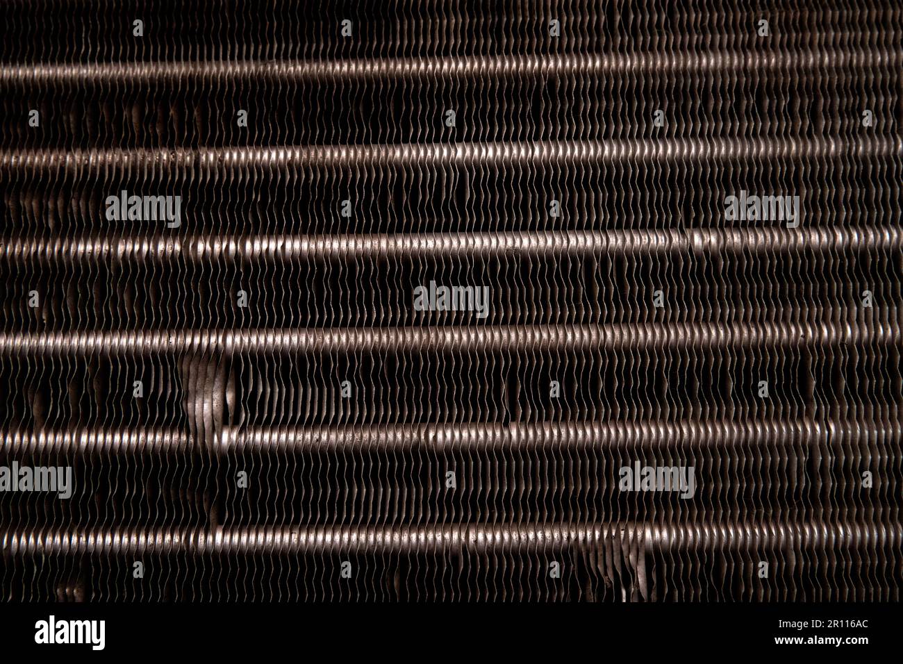 Close Up Of A Window Unit Air Conditioner Coil Textured Background For Industrial Heating And